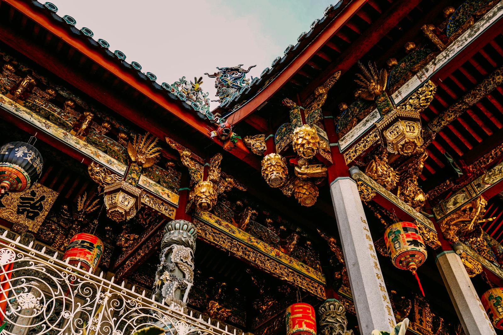 Detailed view of the ornate decorations at Khoo Kongsi Temple, George Town, Malaysia.